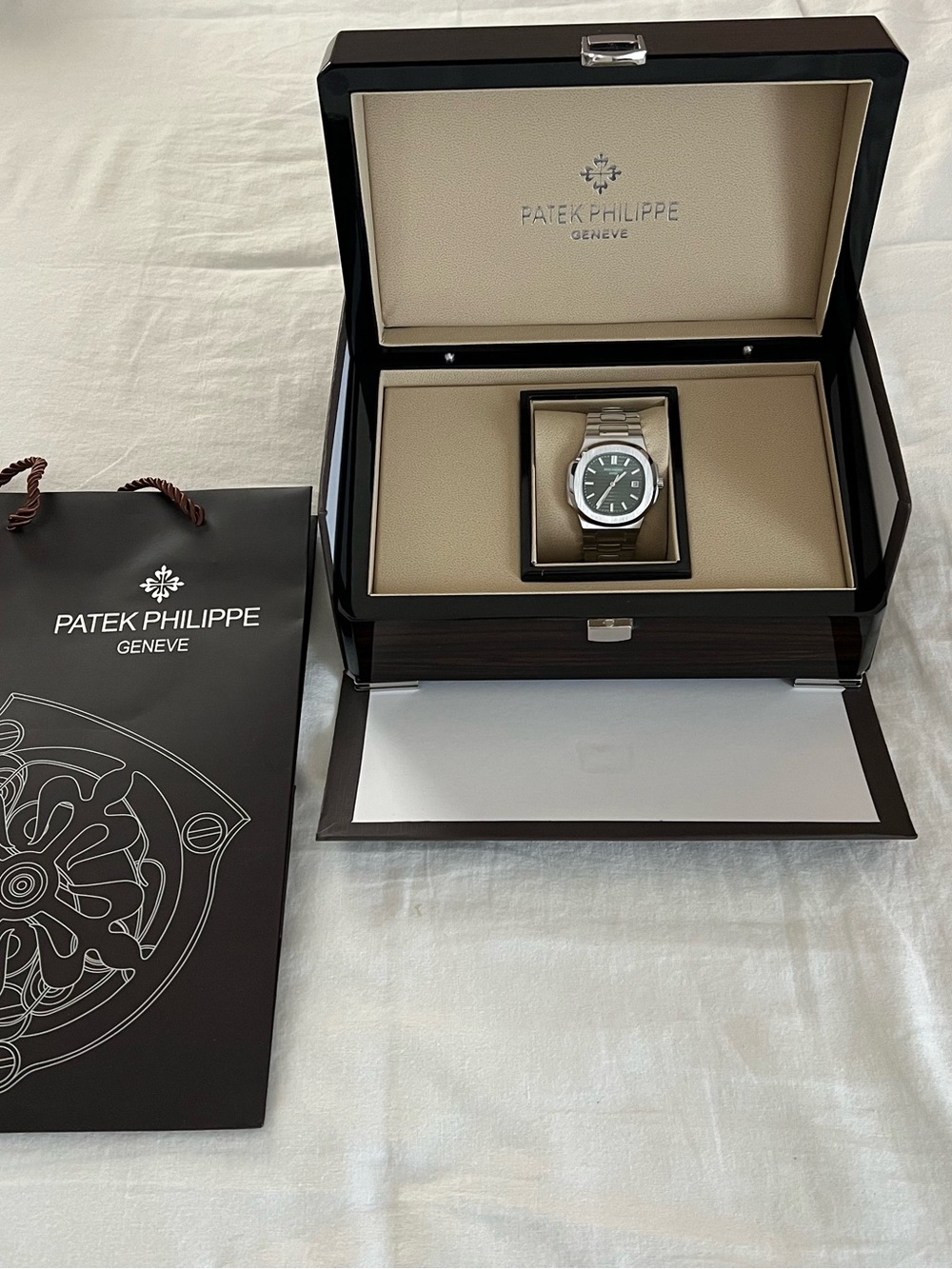 Patek Philippe Men’s Stainless Steel Watch with Green Dial and Silver Bracelet
